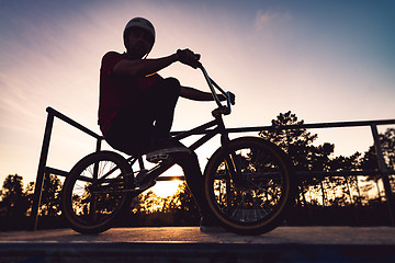 Image showing Bmx rider and his bike silhouette