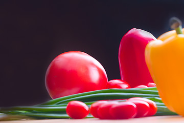 Image showing vegetables on a wooden background