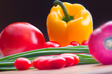 Image showing vegetables on a wooden background