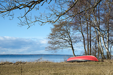 Image showing Coastal spring season view with a small rowing boat on land