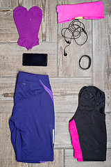 Image showing Flat lay shot of woman\'s sport accessories
