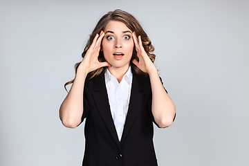 Image showing Portrait of young woman with shocked facial expression