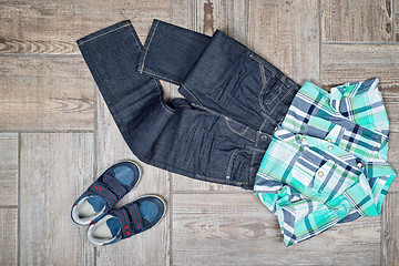 Image showing Flat lay picture of boy\'s casual outfit. 