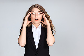 Image showing Portrait of young woman with shocked facial expression