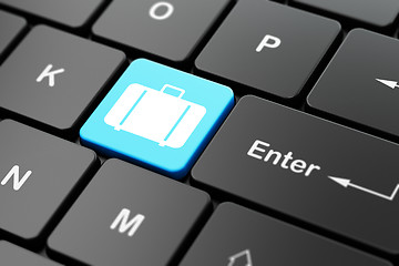 Image showing Travel concept: Bag on computer keyboard background