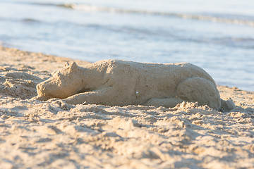 Image showing Sand figure sleplena dog on the beach