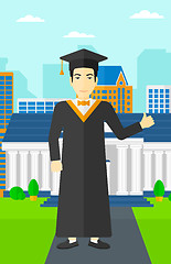 Image showing Graduate showing thumb up sign.