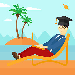 Image showing Graduate lying on chaise lounge with laptop.