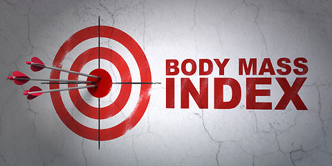 Image showing Health concept: target and Body Mass Index on wall background