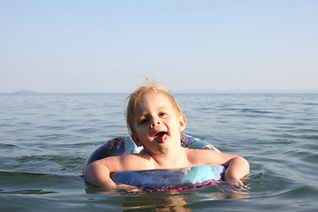 Image showing Baby girl enjoying in the sea