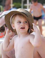 Image showing Baby girl posing on the beach