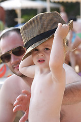 Image showing Baby girl posing on the beach