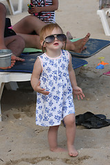 Image showing Baby girl posing on the beach