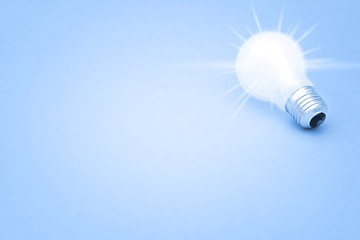 Image showing Background with lit lightbulb