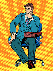 Image showing thoughtful businessman sitting in chair