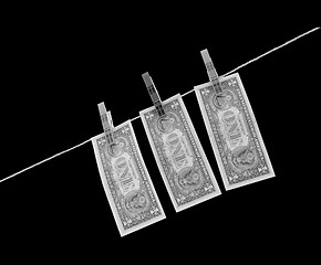 Image showing Dollars on the wire