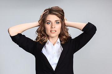 Image showing Portrait of young woman with shocked facial expression