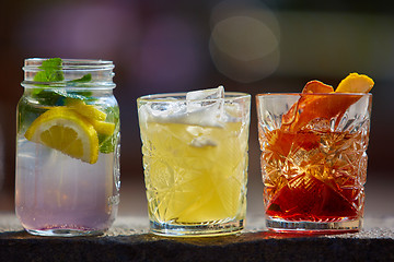 Image showing Negroni, Singapore Sling and fruit tea