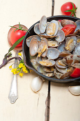 Image showing fresh clams on an iron skillet