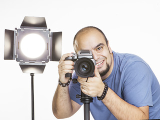 Image showing professional photographer with photographic equipment