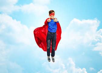 Image showing boy in super hero cape and mask showing thumbs up