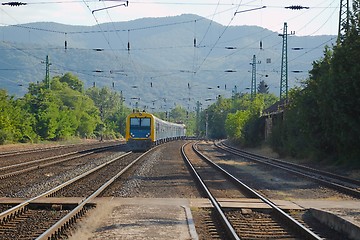 Image showing Railroad tracks with train