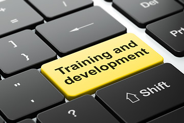 Image showing Learning concept: Training and Development on computer keyboard background