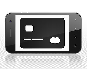 Image showing Finance concept: Smartphone with Credit Card on display