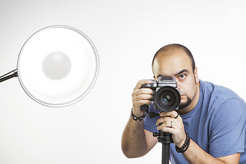 Image showing professional photographer with photographic equipment