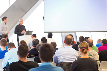 Image showing Male speeker having talk at public event.