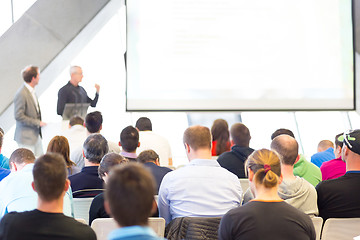 Image showing Male speeker having talk at public event.