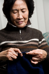 Image showing Senior woman knitting