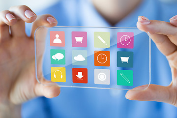 Image showing close up of woman with transparent smartphone