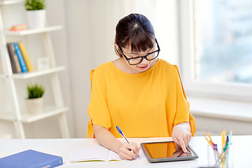 Image showing asian woman student with tablet pc at home