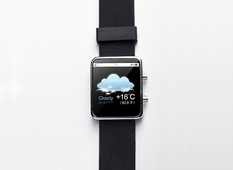 Image showing close up of smart watch with weather forecast app