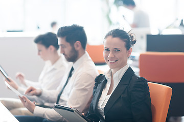 Image showing business woman on meeting  using tablet