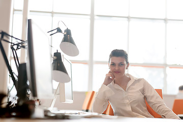 Image showing business woman working on computer at office