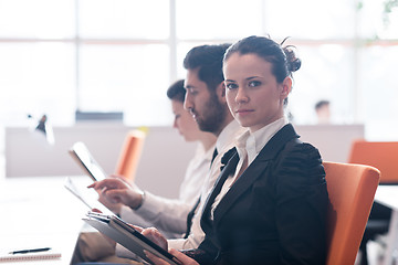 Image showing business woman on meeting  using tablet