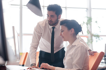 Image showing business couple working together on project