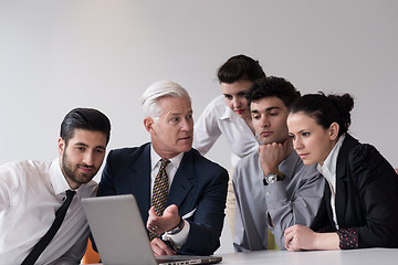 Image showing business people group on meeting at modern startup office