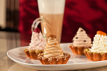 Image showing cakes with berries and nuts