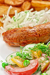 Image showing Roasted sausage with vegetables 