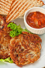 Image showing potato pancakes with jam