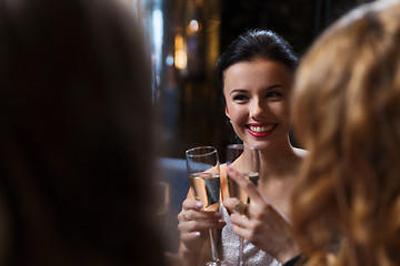 Image showing happy women with champagne glasses at night club