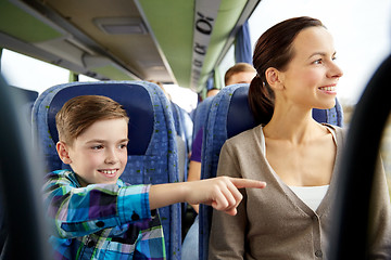 Image showing happy family riding in travel bus