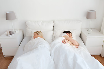 Image showing couple sleeping in bed at home