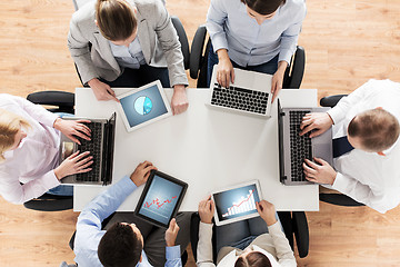 Image showing business team with laptop and tablet pc