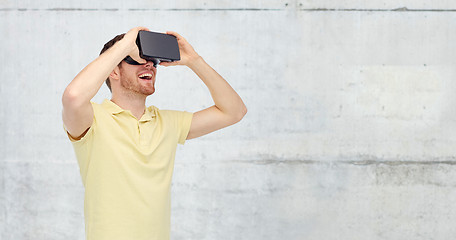 Image showing happy man in virtual reality headset or 3d glasses