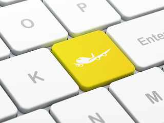 Image showing Tourism concept: Airplane on computer keyboard background