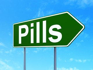 Image showing Medicine concept: Pills on road sign background